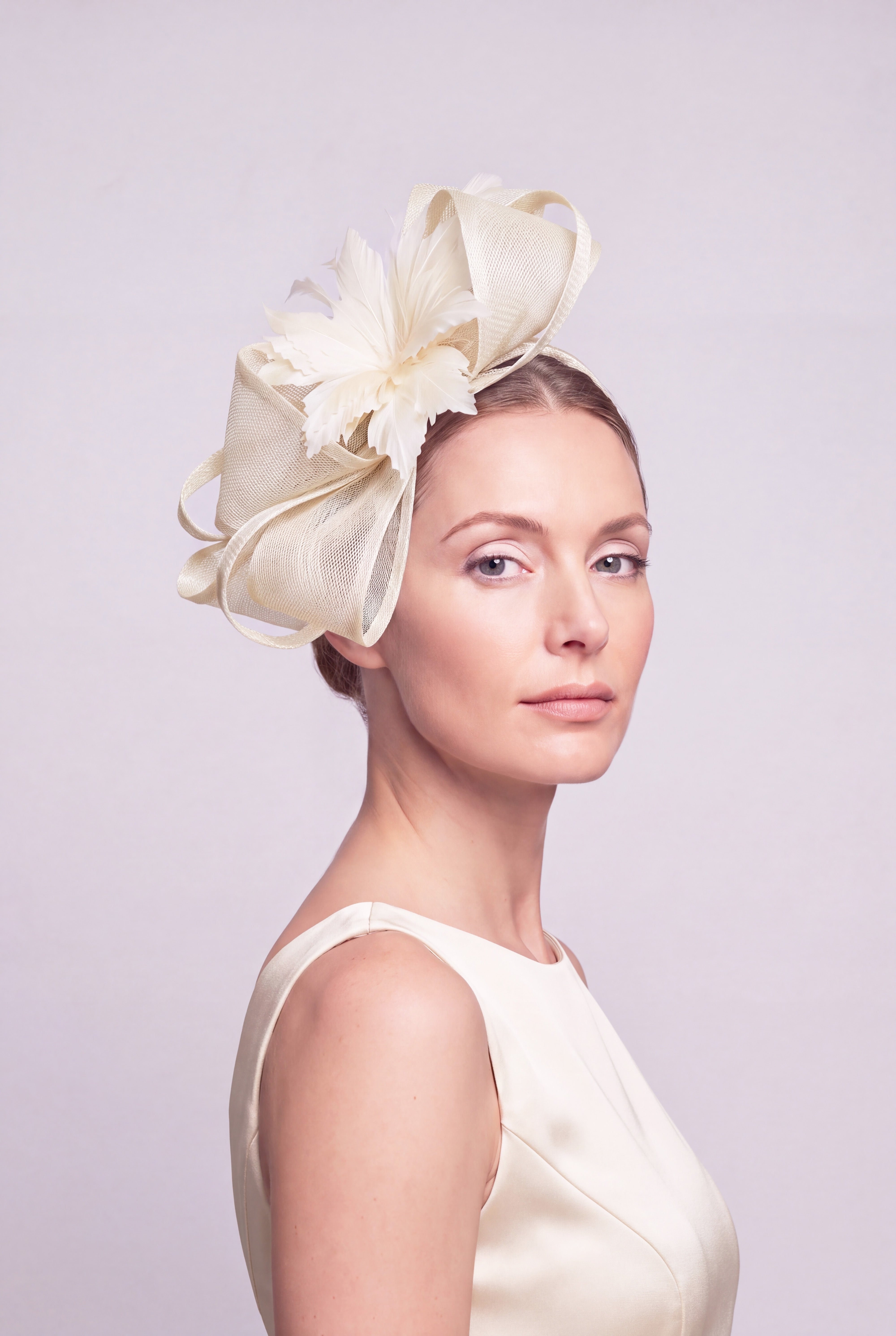 Curly Sinamay Fascinator with Feather Flower