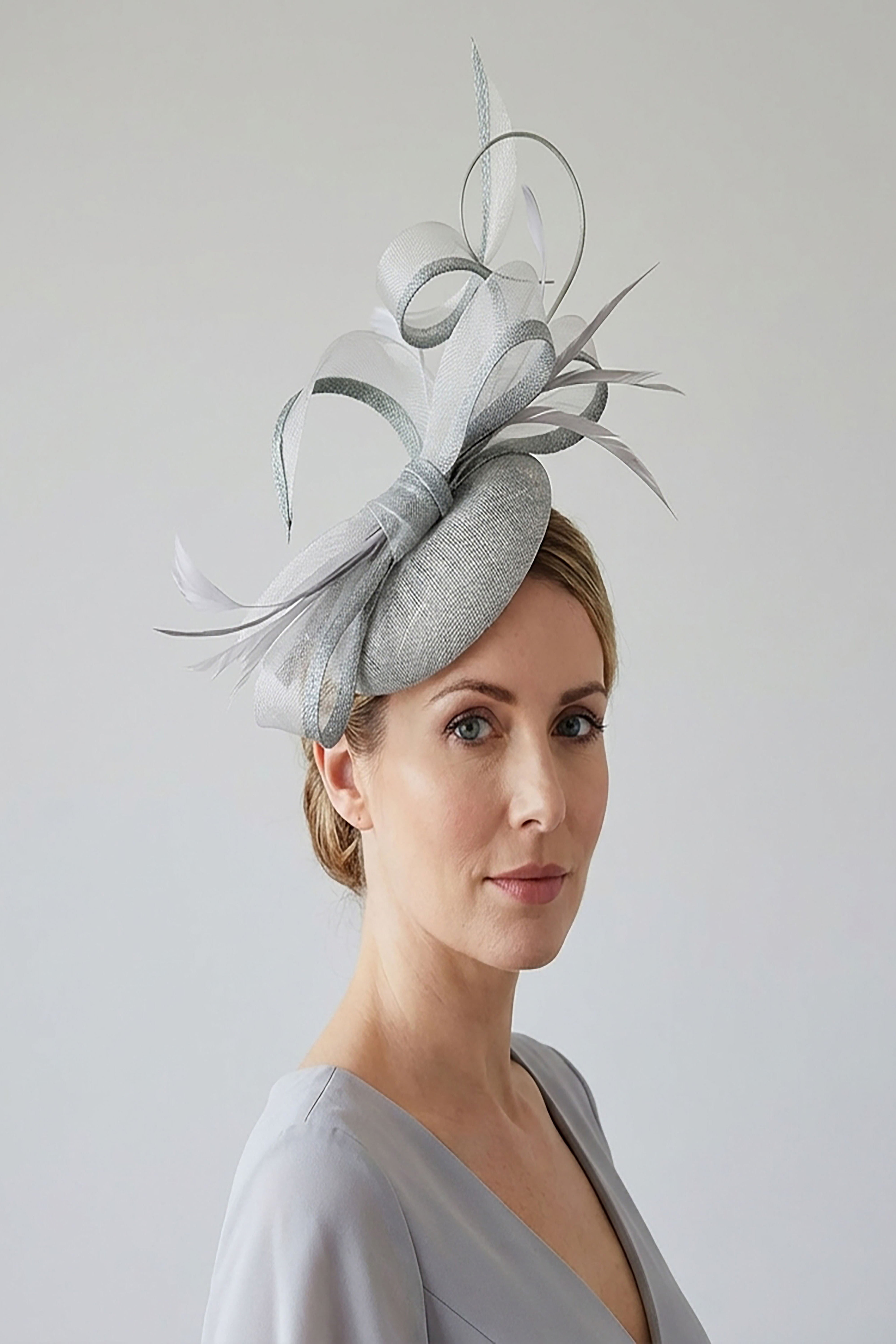 Elegant Loop Mesh Fascinator with Feather Detail