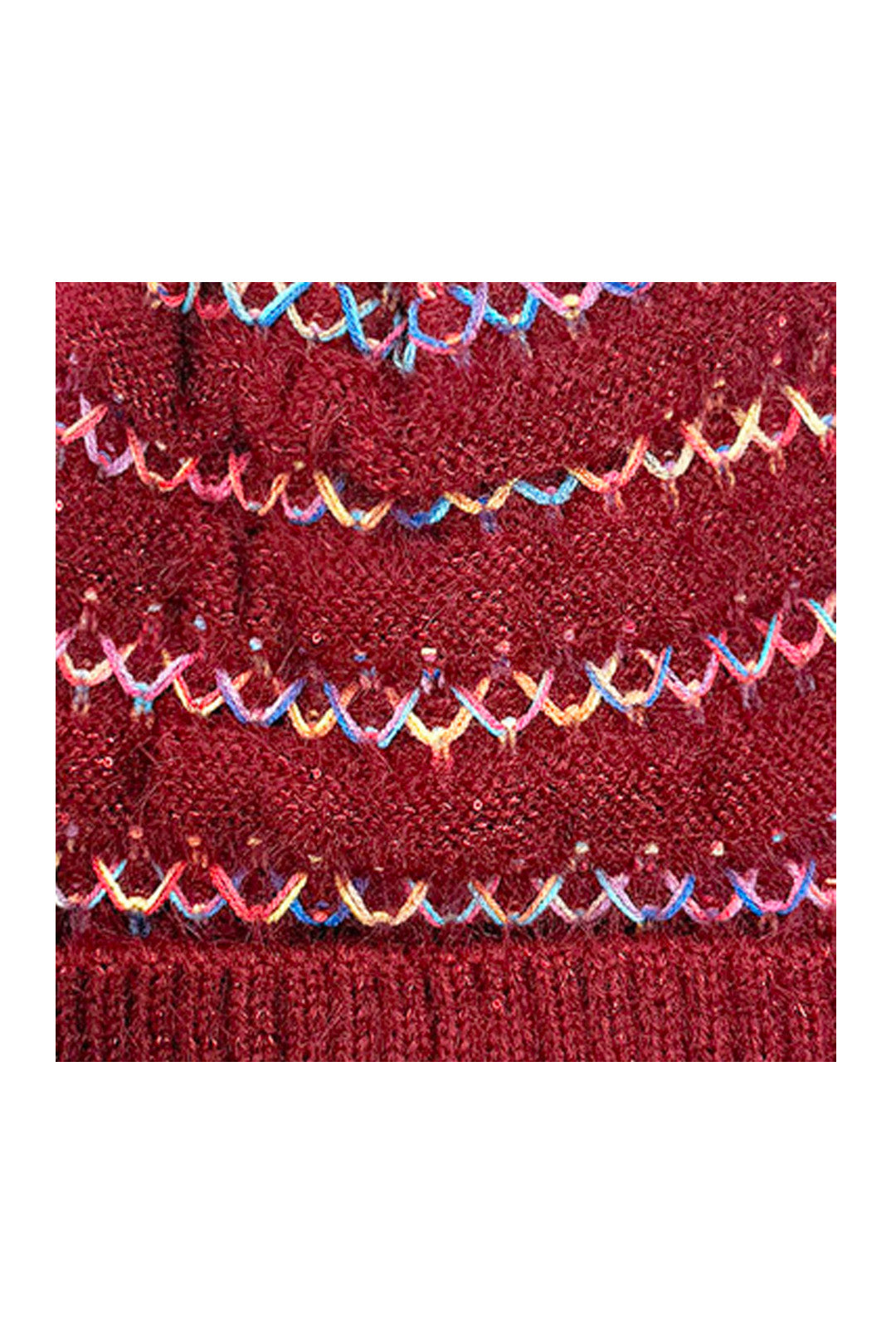 Pom Pom Hat with Colourful Cross Stitch Detail