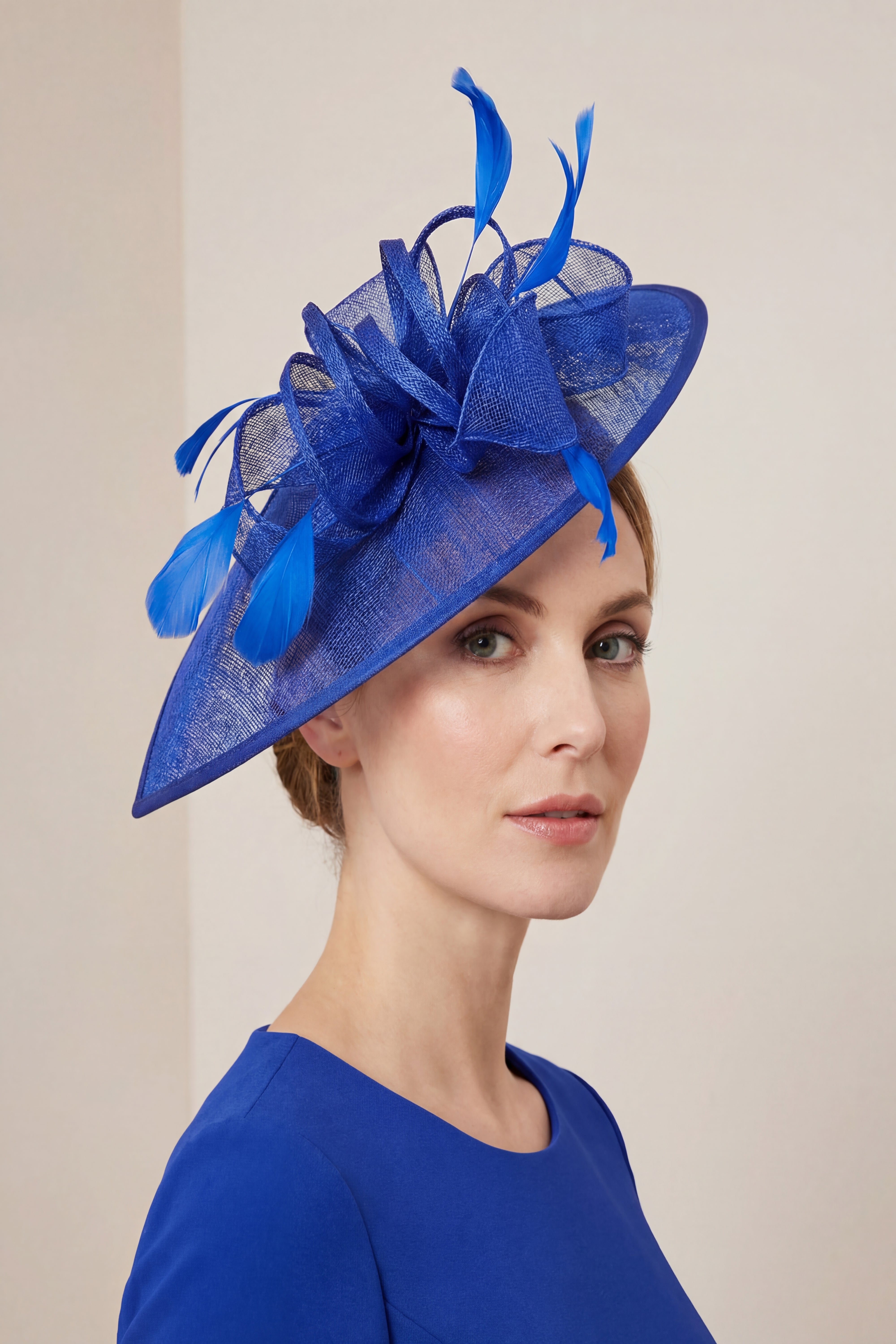 Mesh Disc Fascinator with Bow and Feather Detail