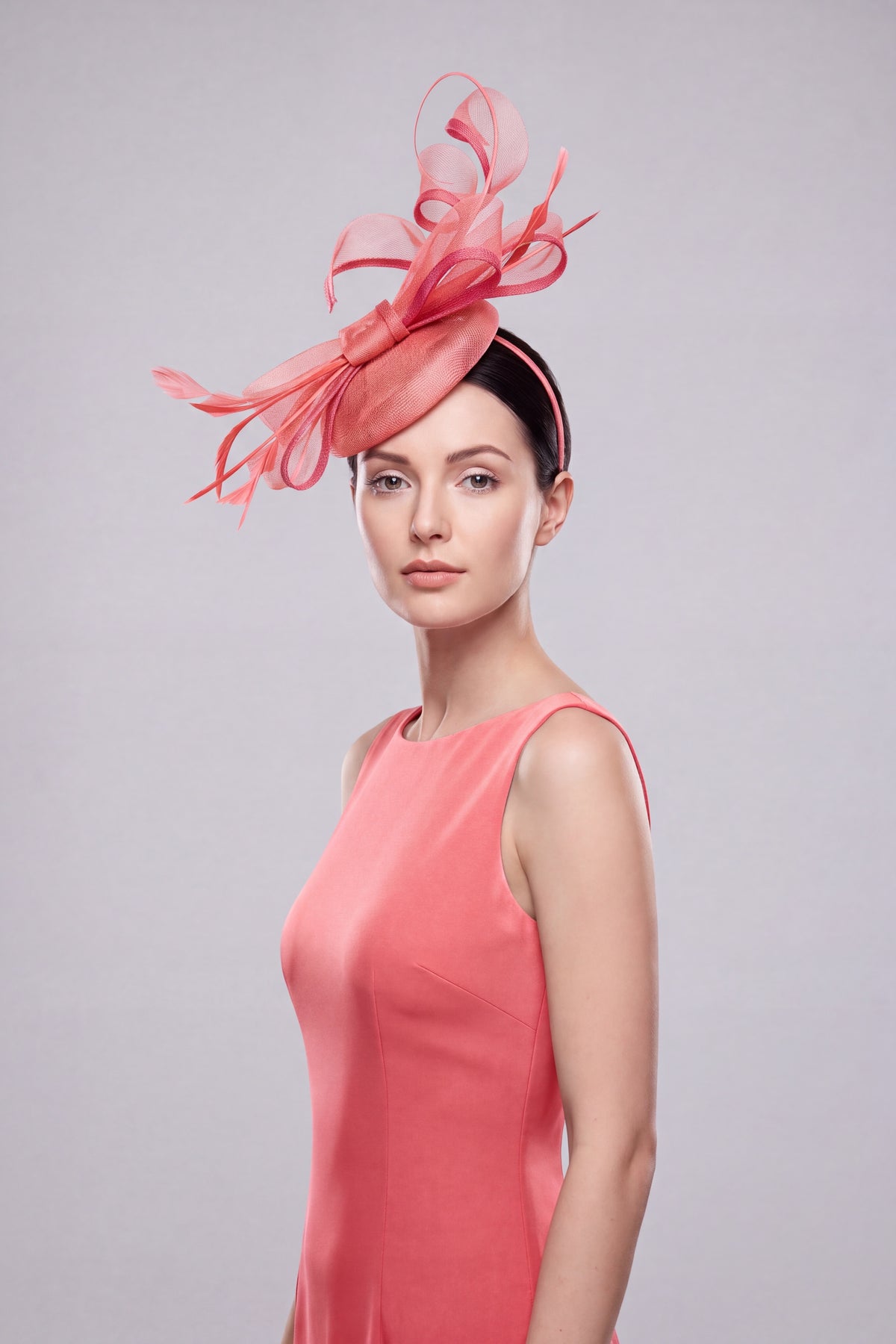 Elegant Loop Mesh Fascinator with Feather Detail