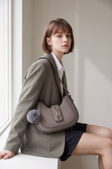 Women’s Curved Shoulder Bag with Pom Pom & Crossbody Strap
