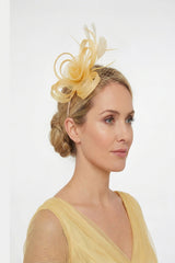 Looped Sinamay Bow Fascinator with Feather & Net Detail